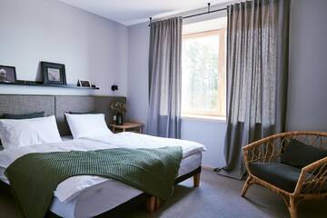 Фото номера Апартаменты - 1-й этаж Загородные дома Barono Vila г. Butėnai 2