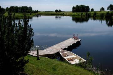 Фото номера Шале с двумя спальнями Загородные дома Barono Vila г. Butėnai 11